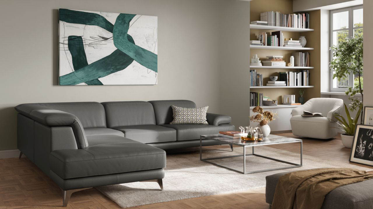 Sofá Natuzzi Editions de diseño italiano en salón contemporáneo, showroom Ambientes Málaga