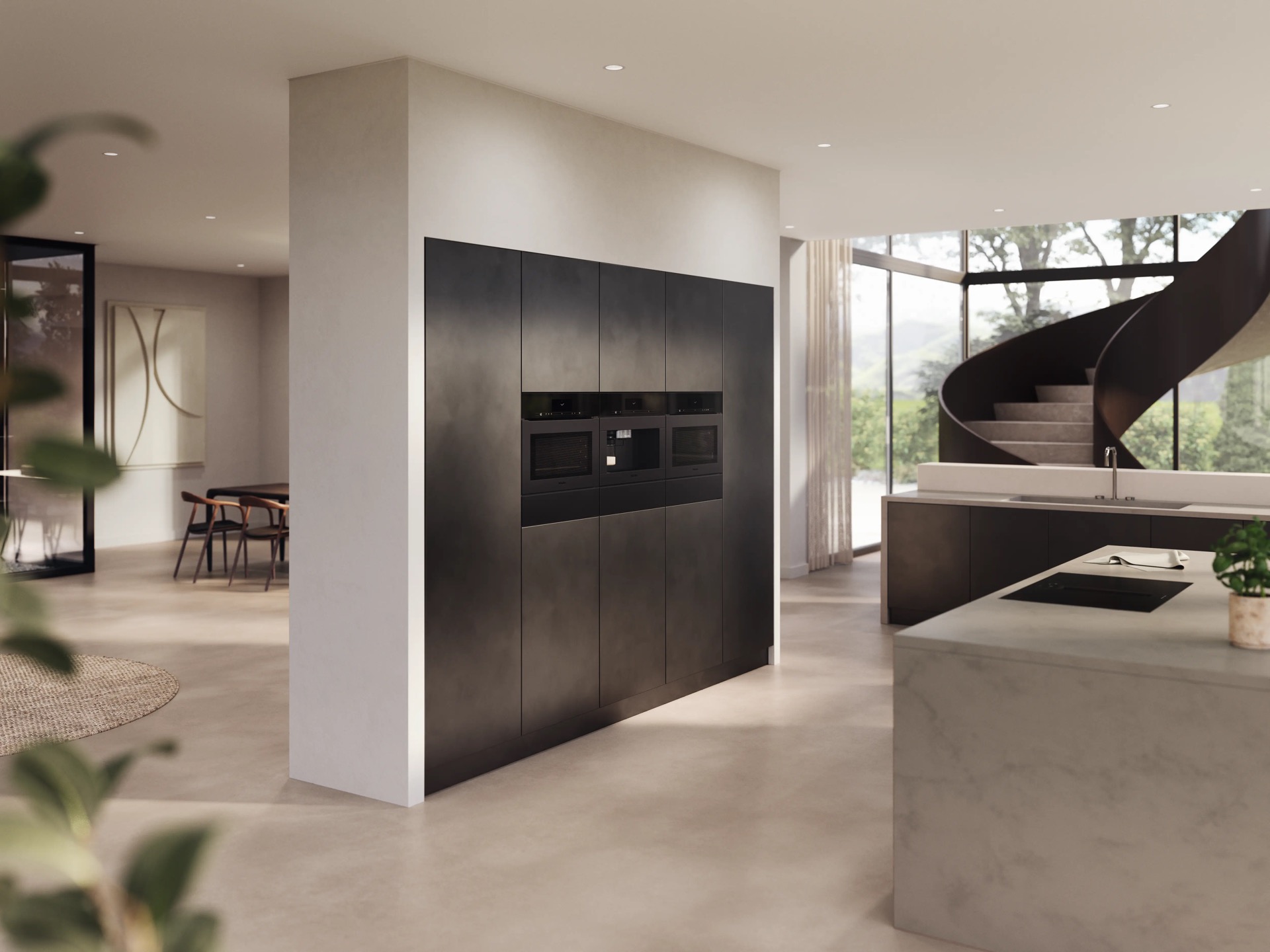 Columna alta cocina Miele acabado oscuro hornos integrados escalera espiral proyecto reforma